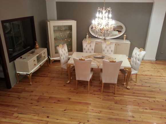 avangarde beyaz altın varak ahşap led ışıklı yemek odası takımı sandalyeler kadife kumaş ve ahşap başlıktır